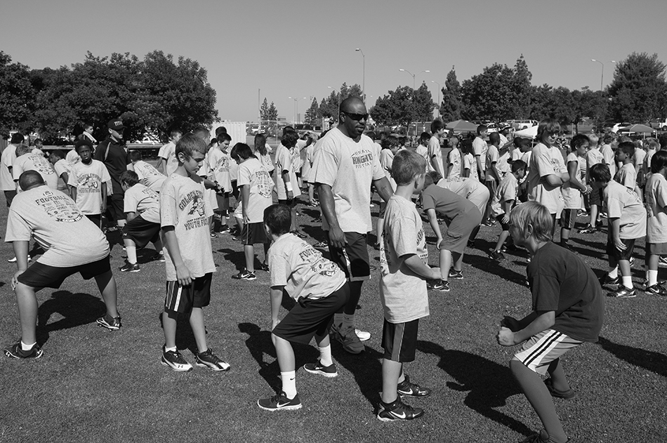 Boys and coaches enjoy football camp knowing they’re protected by Accident Medical protection. 